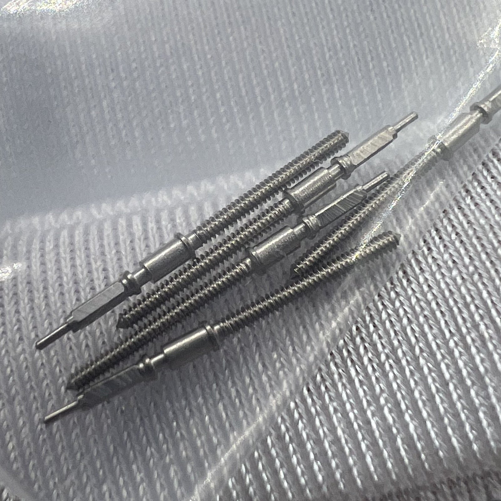 Chongqin watch stem for PT5000 movement, precise replacement part ideal for watch repair and maintenance.