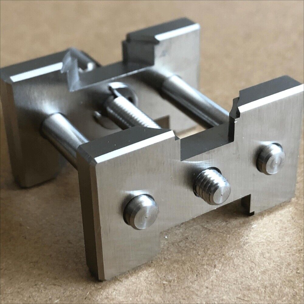 Stainless Steel Universal Watch Movement Holder, ideal for precise watch repair tasks.
