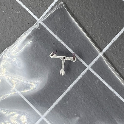 Pallet fork for Dandong 7750 watch movement, precision replacement part for reliable timekeeping.