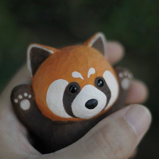 Handmade Little Panda wooden figurine, detailed collectible sculpture for watch accessory display.