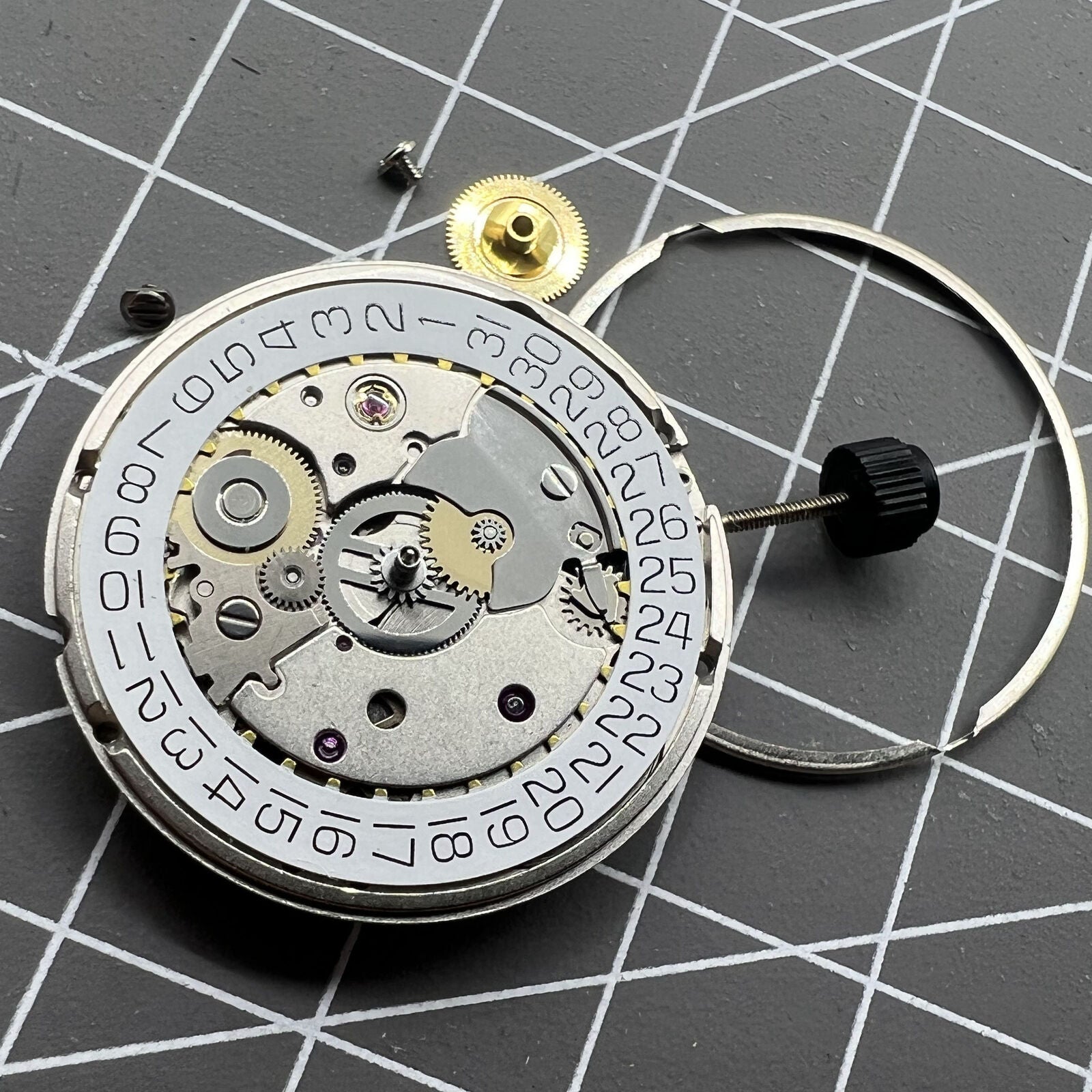 Original Silver SW200-1 automatic watch movement by ETA, precise mechanical replacement part for watches.