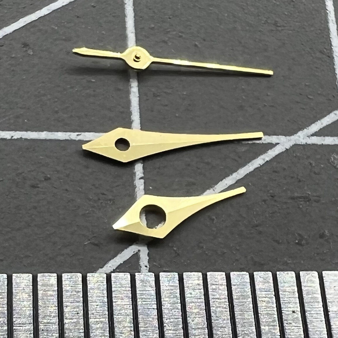 Set of 2 golden 6.5mm pointed trim watch hands for Miyota 2315 and 2035 movements.