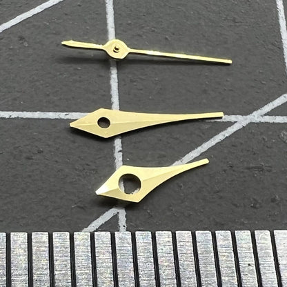 Set of 2 golden 6.5mm pointed trim watch hands for Miyota 2315 and 2035 movements.