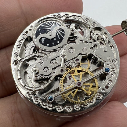 Double Mainspring mechanical watch with hollow design and dual time zone by Double Mainspring.