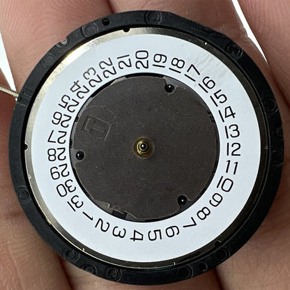 ETA G10.711 Swiss made quartz watch movement with 3 hands and date display, precise and reliable for repairs.