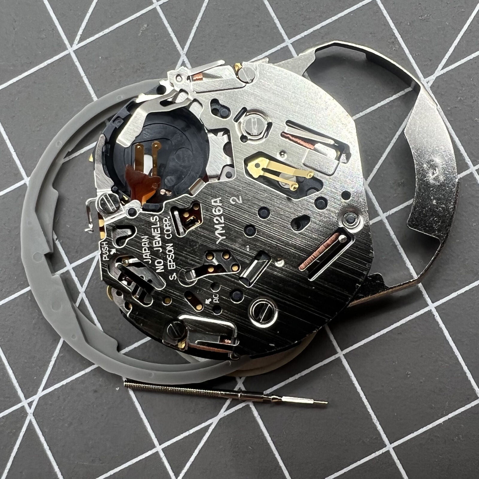 Hattori Epson TMI YM26A quartz watch movement, Japan-made, precise replacement for watch accessories.
