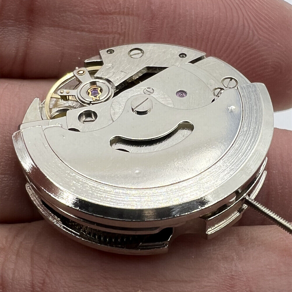 Dandong 7120 automatic watch with single calendar, date display at 3 o'clock, China-made timepiece.