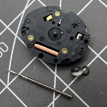 Epson TMI VX10A quartz watch movement with 2 hands, precise timekeeping for watch repair.