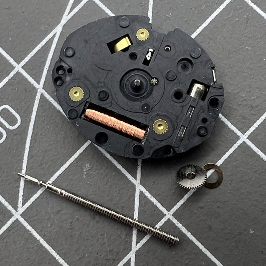 Epson TMI VX10A quartz watch movement with 2 hands, precise timekeeping for watch repair.