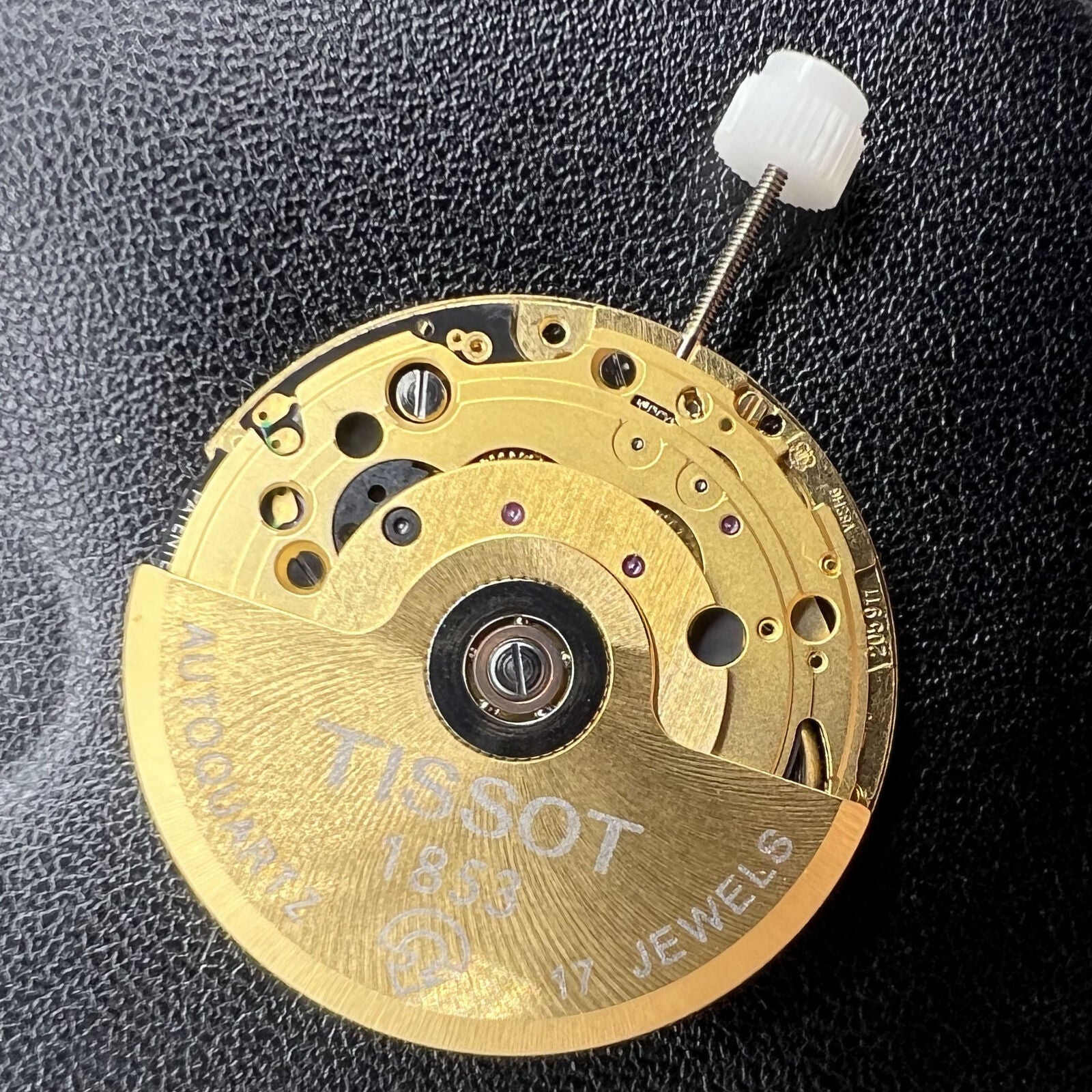 Swiss Made ETA205.911 golden watch movement for kinetic watches, precision craftsmanship by ETA brand.