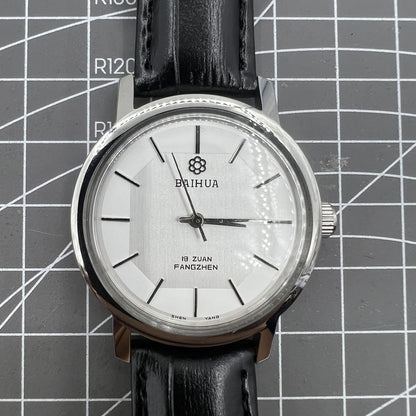 China Baihua 37mm manual watch with silver dial, 19 jewels, shock-resistant for lasting durability