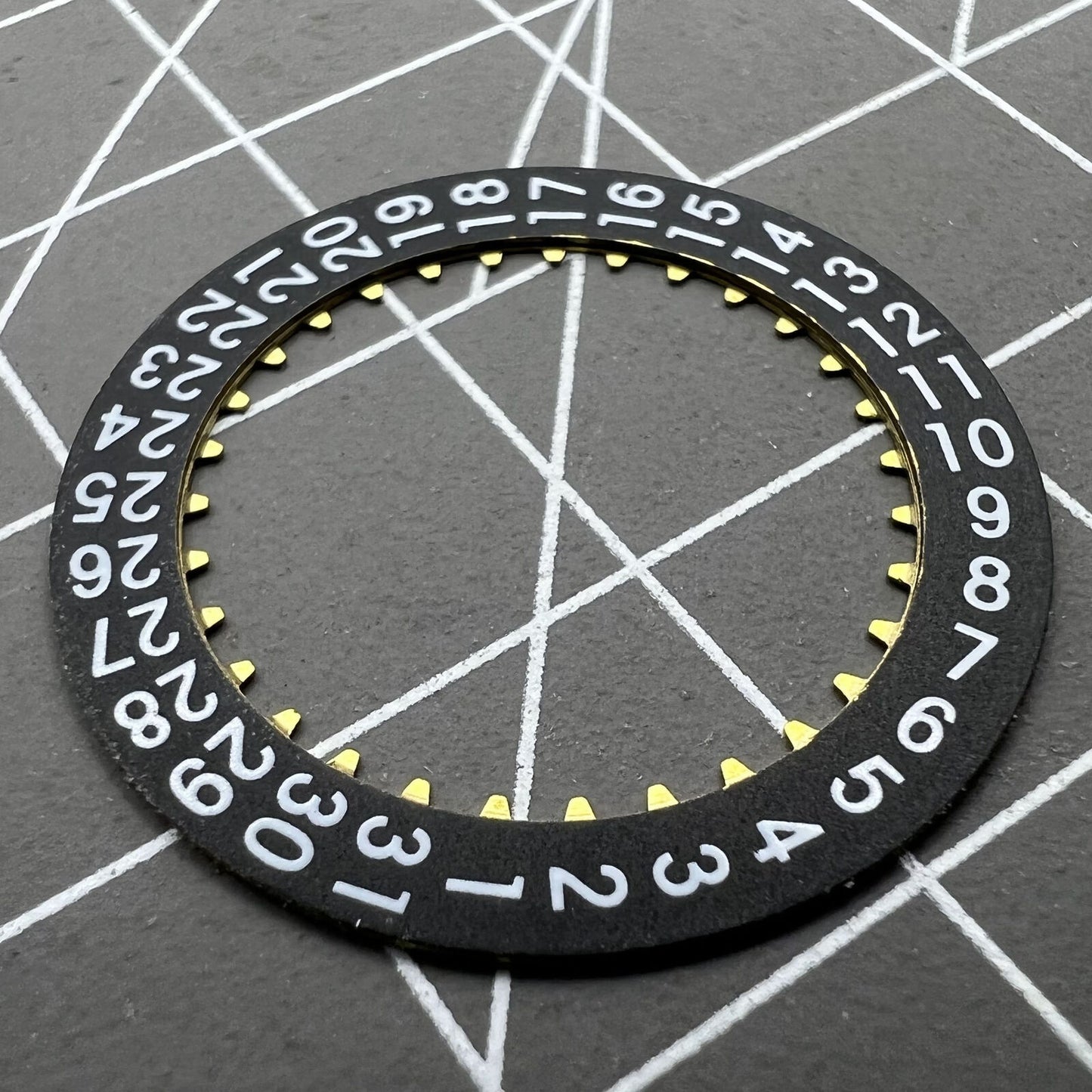 Black date disk wheel for China Made 7750 movement, showing date at 3 o'clock position.