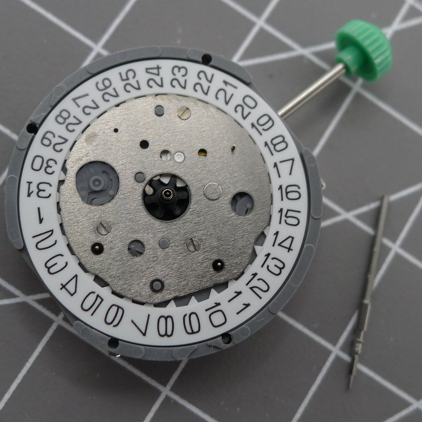 Miyota FS21 chronograph quartz watch movement with date at 4, made in Japan, precision timing accessory.