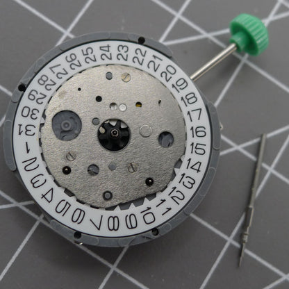 Miyota FS21 chronograph quartz watch movement with date at 4, made in Japan, precision timing accessory.