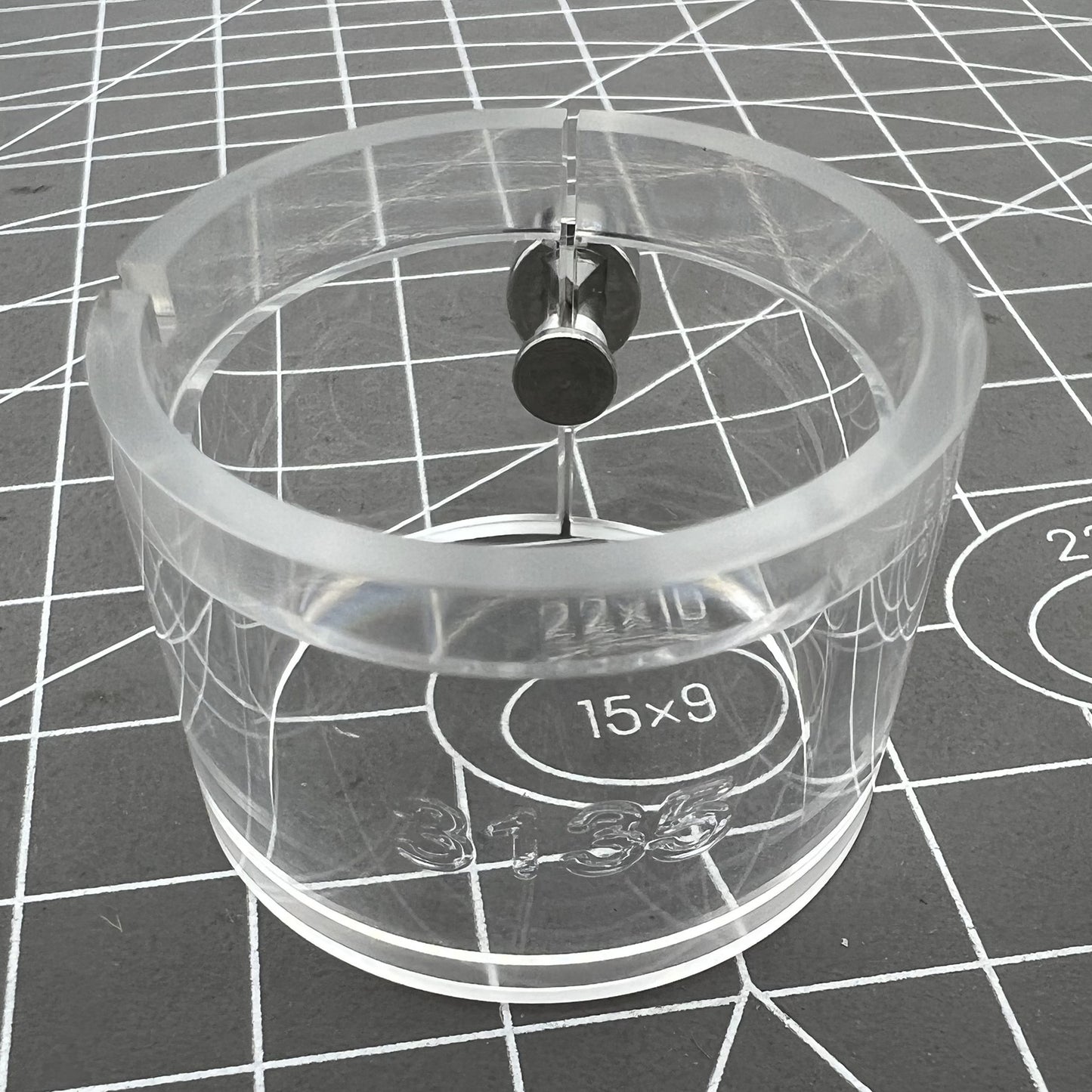 Transparent watch movement holder for RLX3135, secure and precise accessory.