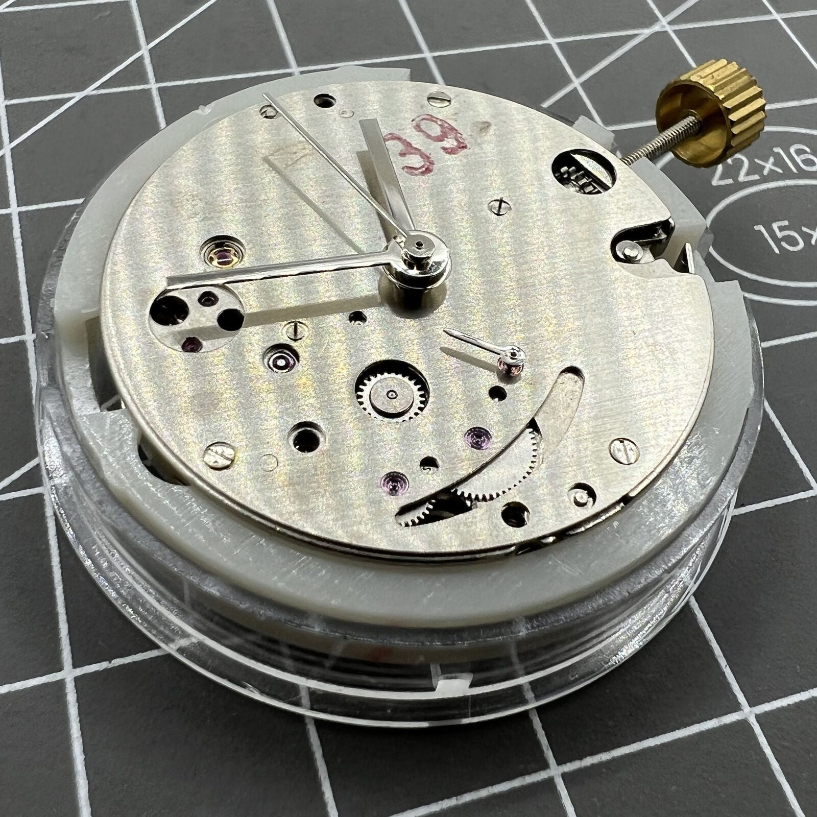 Dandong 7750 automatic watch movement with small seconds at 6 o'clock, ultra-thin design.