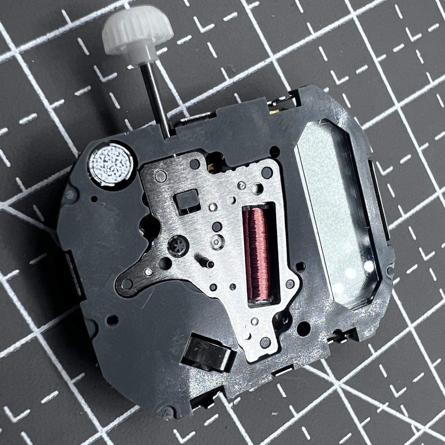 Japan Miyota T480 quartz movement watch mechanism with 3 hands and display screen for precise timekeeping.