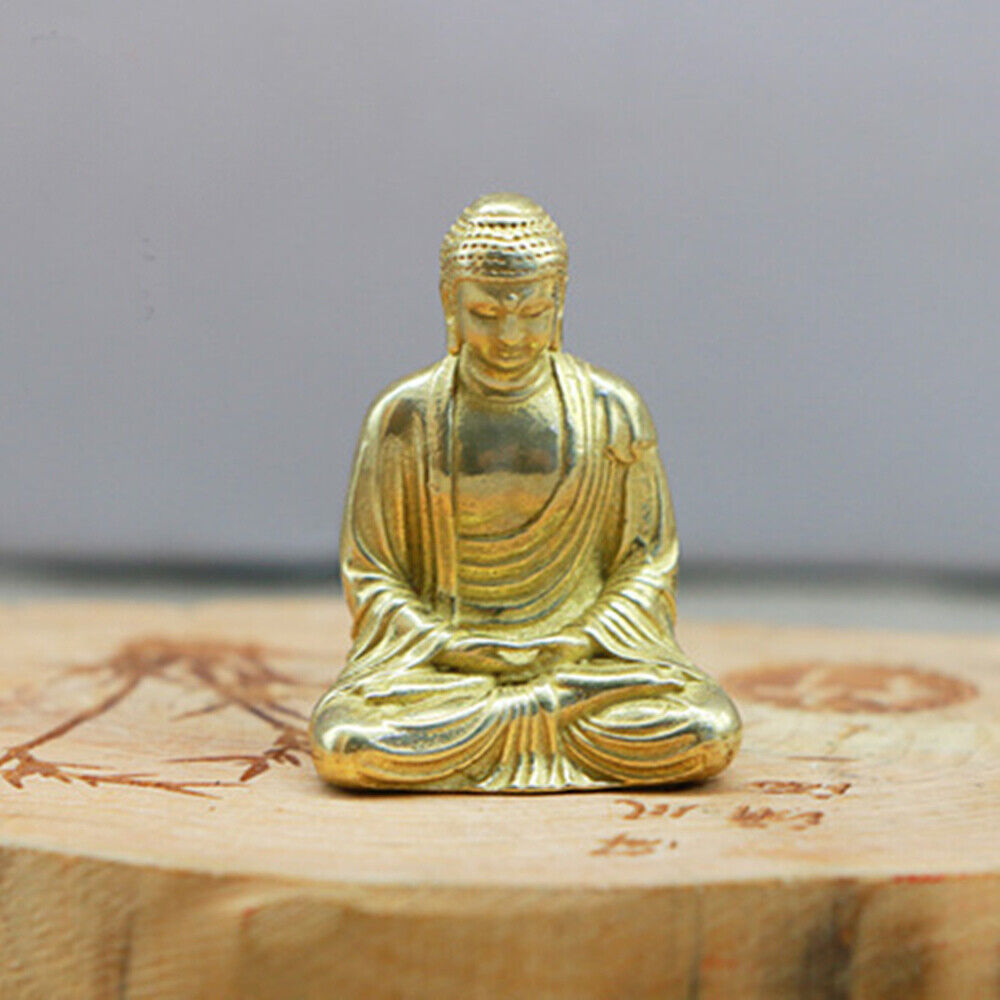 Vintage solid copper Buddha figurine, hand-carved bronze trinket ideal for spiritual home decor.