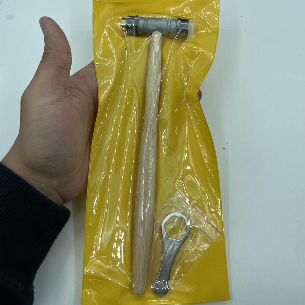 Bergeon 30417 watchmaker hammer with brass and synthetic ends for precise watch repair tasks.