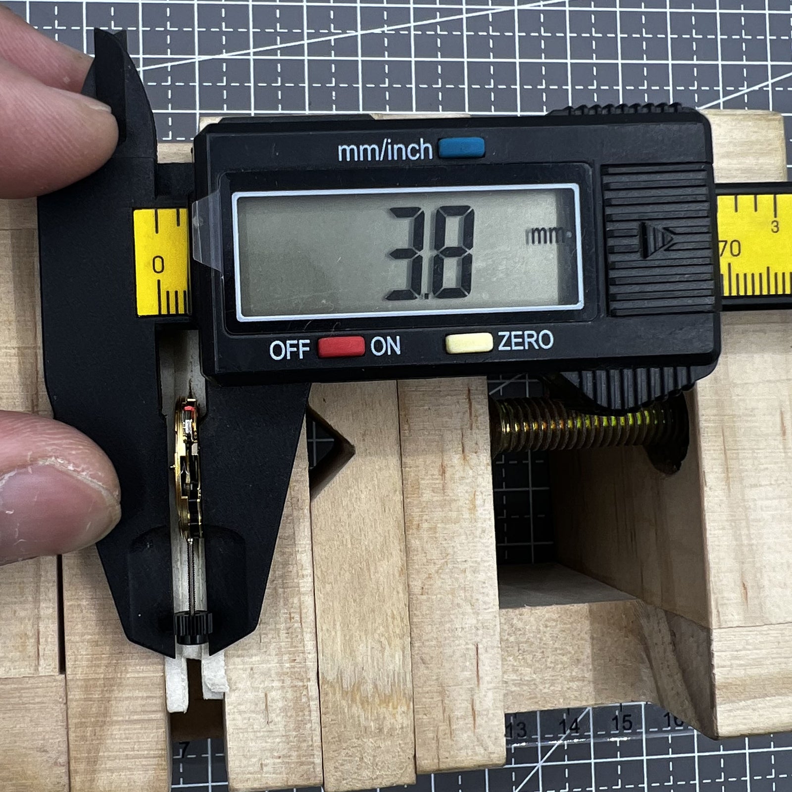 ETA F03.115 quartz watch movement showing 3 hands and date window at 3 o'clock for precise timekeeping.