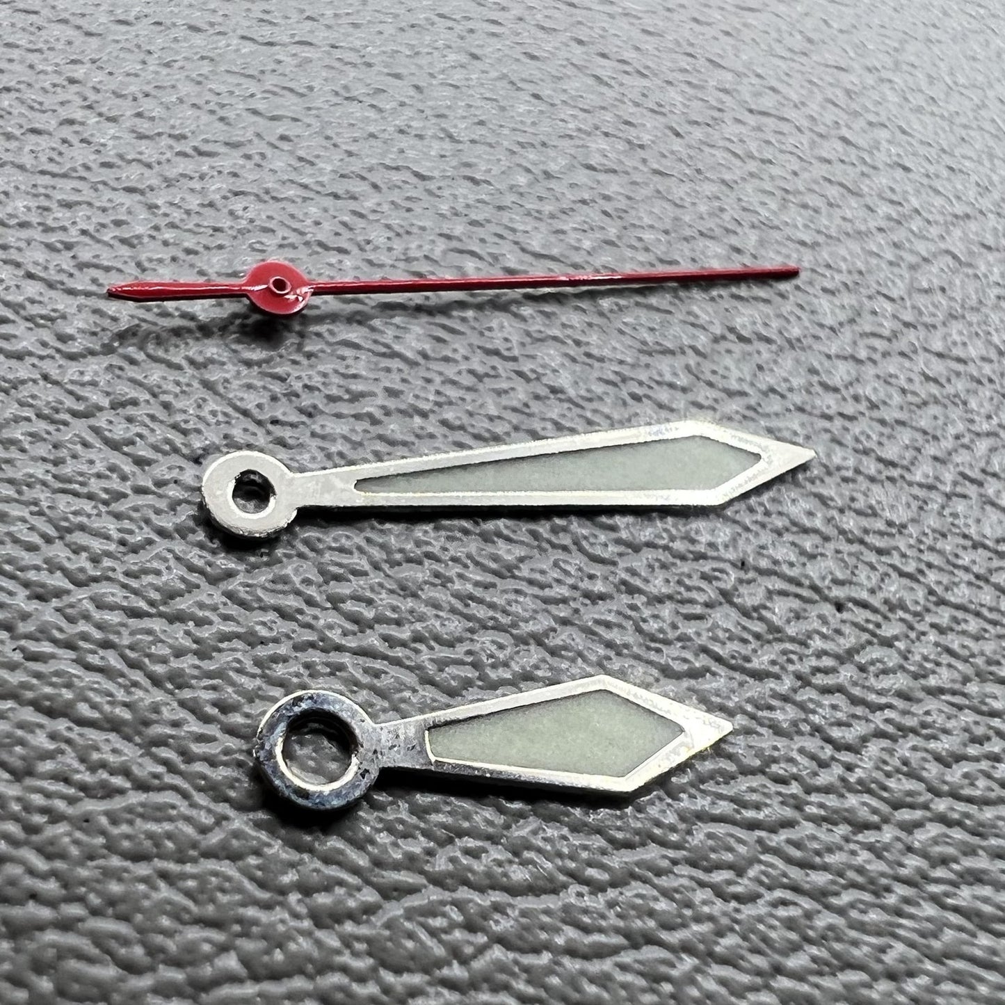 Silver-trimmed red second hand and green lume hour and minute hands for Miyota 1M12 watches.