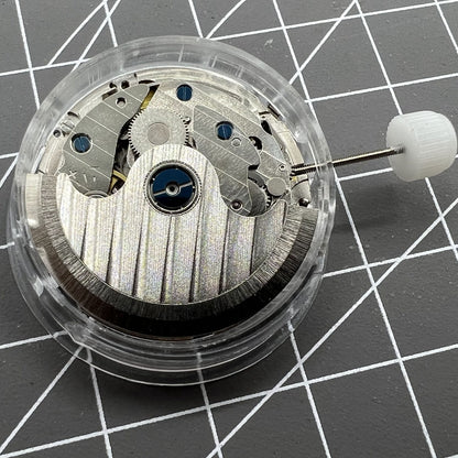 ST10 watch accessory with automatic movement, date at 3 o'clock, and multi-position small seconds.