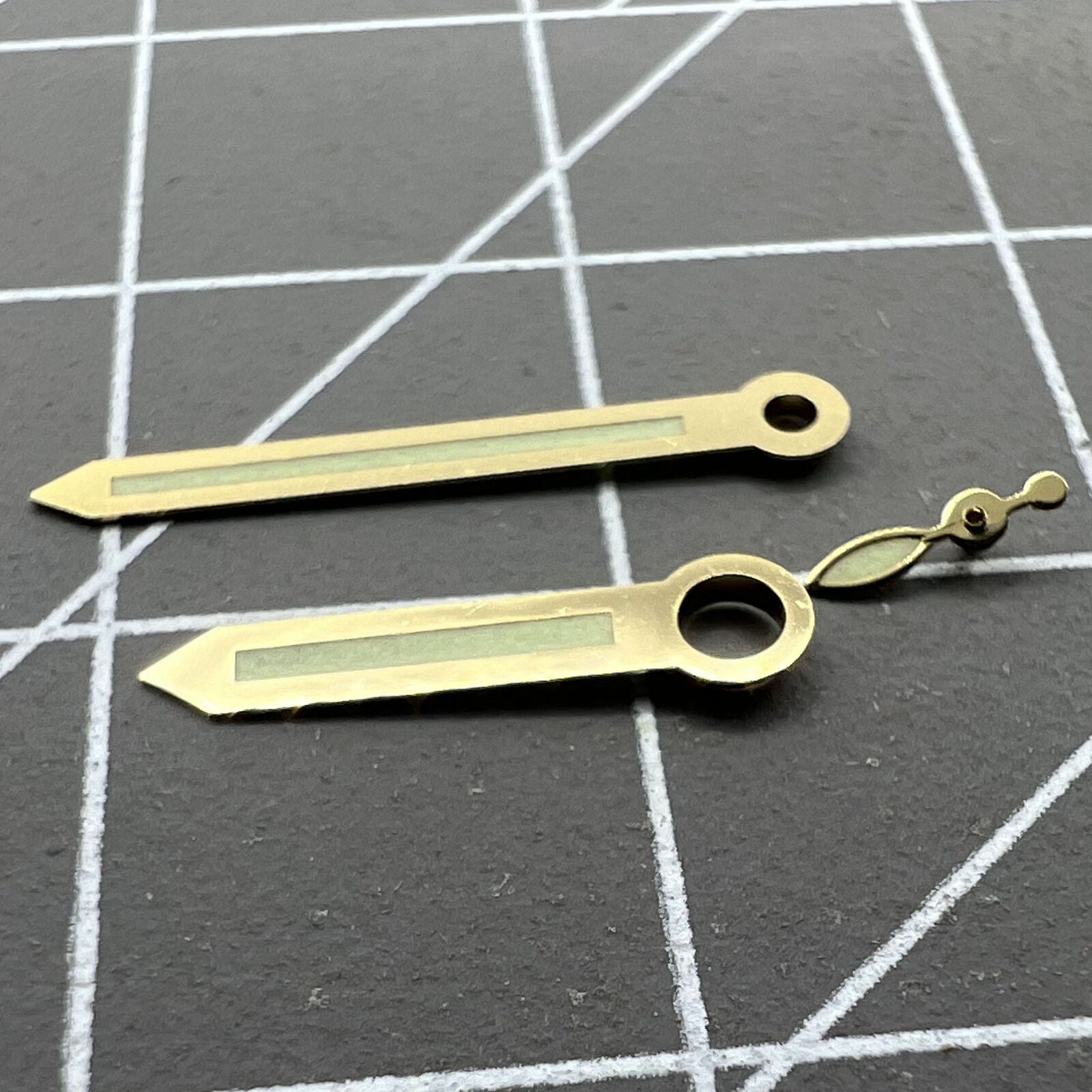 Golden trim green luminous watch hands for ST3600 movement, enhancing visibility and style.