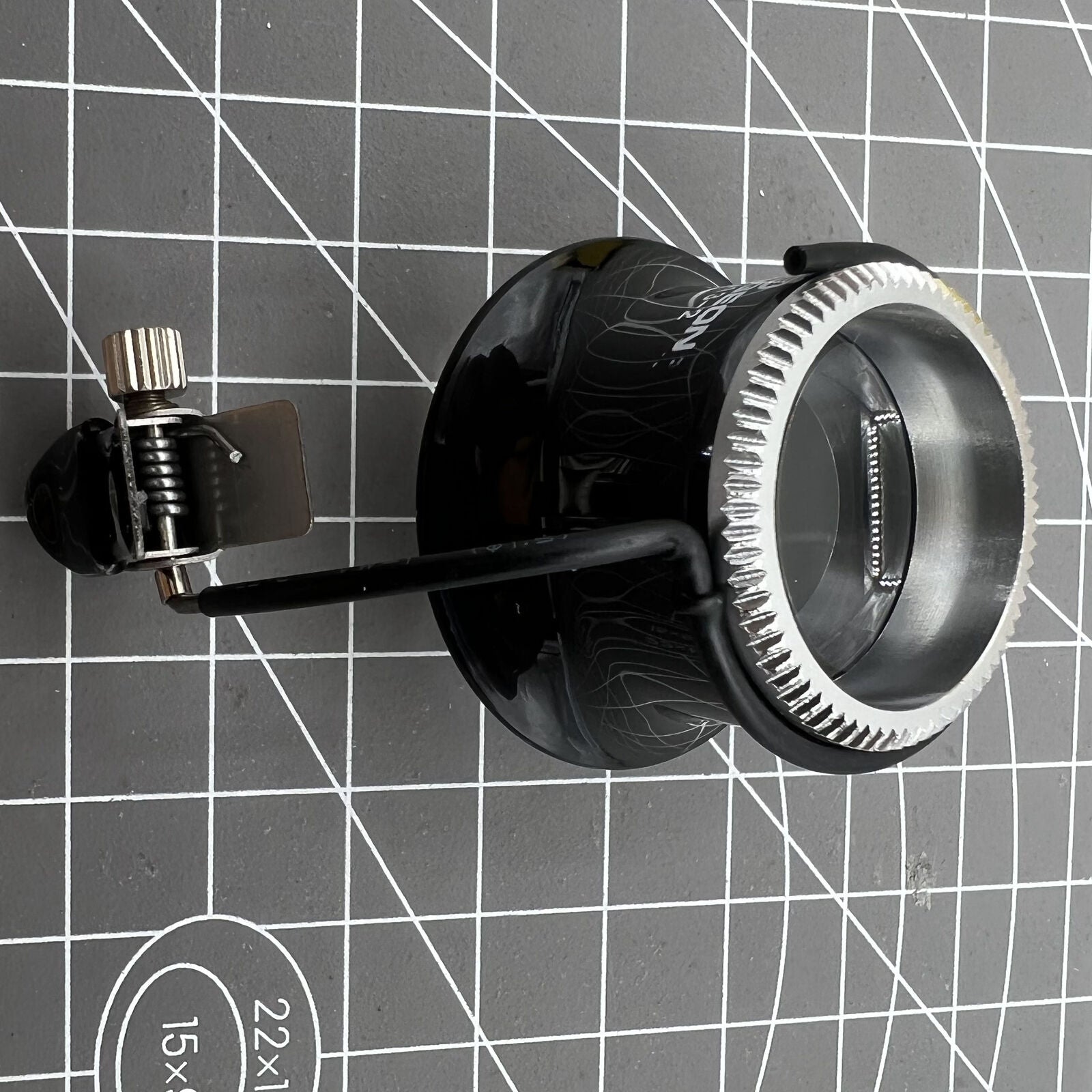 Swiss Bergeon eyeglass with clip for precise watch repair magnification, ideal for detailed accessory work