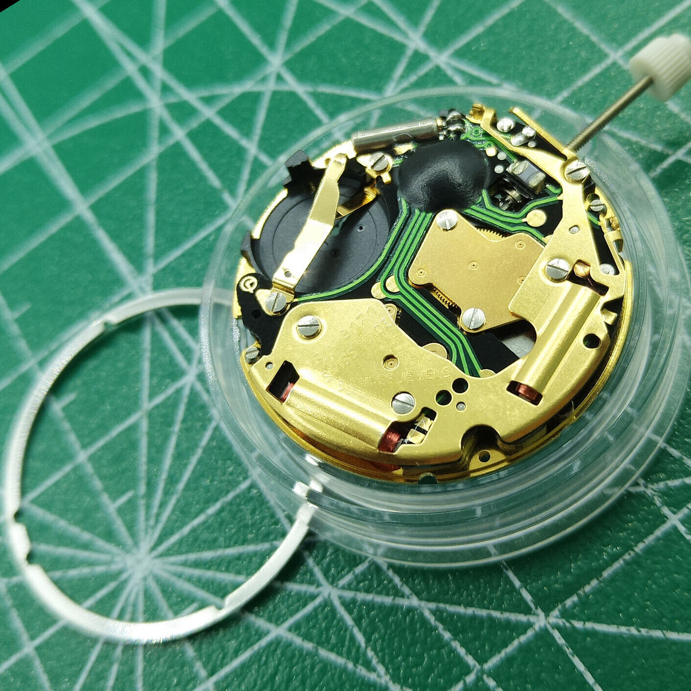 Swiss ISA 8171 quartz watch movement with date at 6, multifunctional for precise timing and durability.