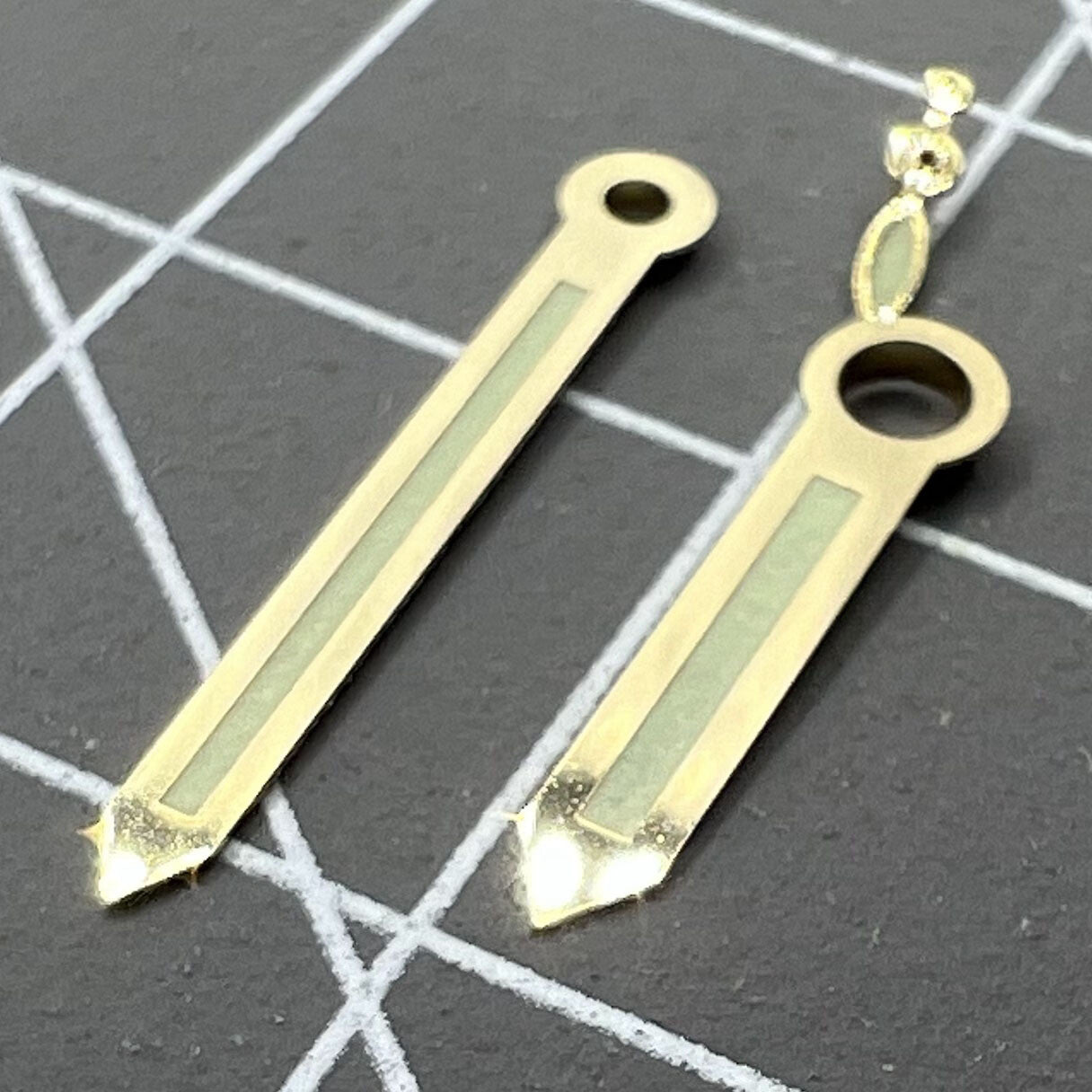 Green luminous watch hands with golden trim for ST3600 movement, adding style and night visibility.