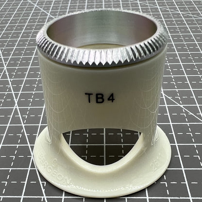 Swiss Bergeon 2.5x magnification loupe with opening, precision watchmaker tool for detailed accessory inspection.