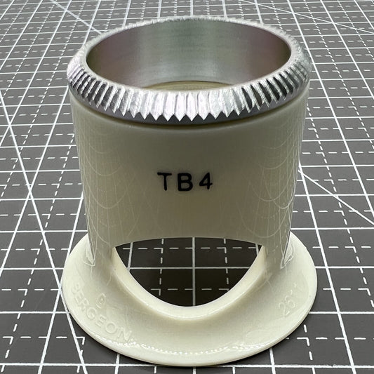 Swiss Bergeon 2.5x magnification loupe with opening, precision watchmaker tool for detailed accessory inspection.