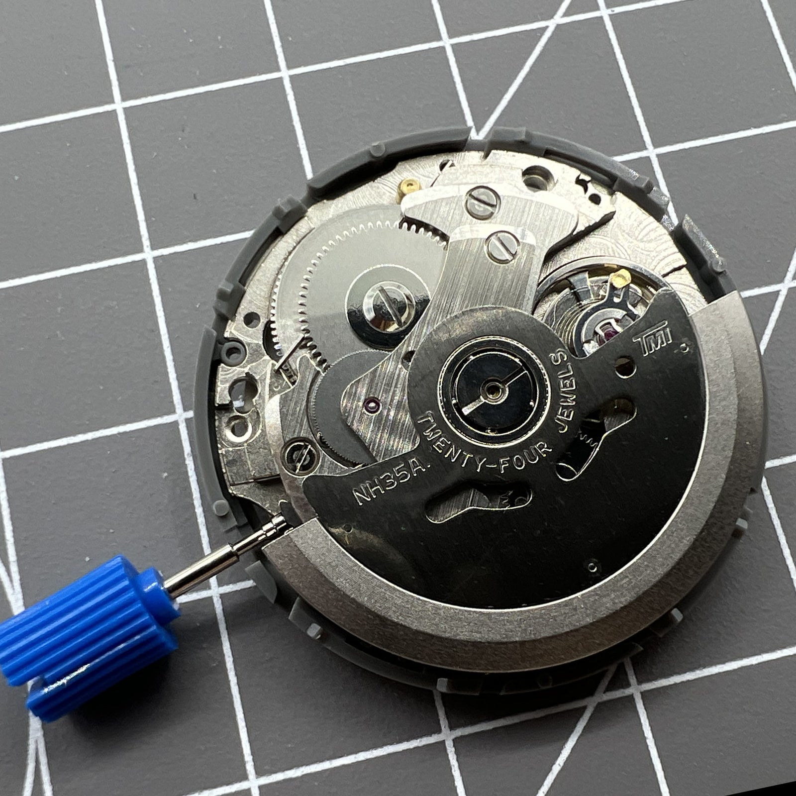 NH35A automatic mechanical watch movement with golden date display and crown at 3 o'clock, perfect for SKX007 accessories.