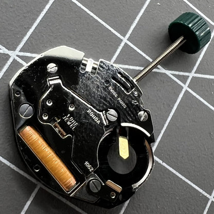 Swiss Made Ronda 1062 quartz watch movement with 2 hands, precise Swiss components for watchmaking.