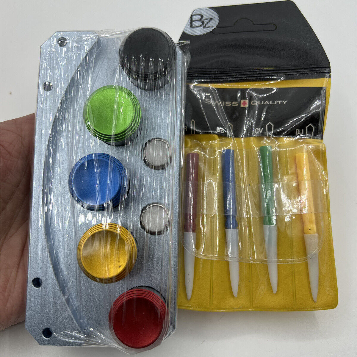 Silver oil cup stand with 5 die-cast alloy containers and oiler pen for precise watch repair.