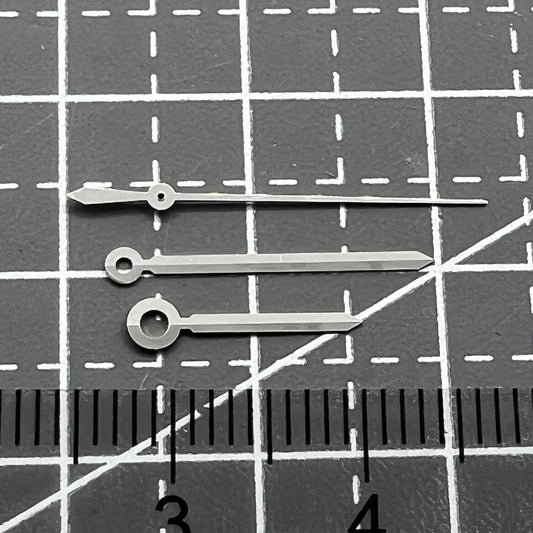 Silver watch hands set for ETAC07.111 movement, compatible with T099 watch, precision design.