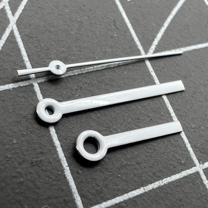 White watch hands set by Miyota, 15x13x9mm, compatible with 2035, 2115, 2105, 2305, 2315 movements, precise accessory for watch repair.