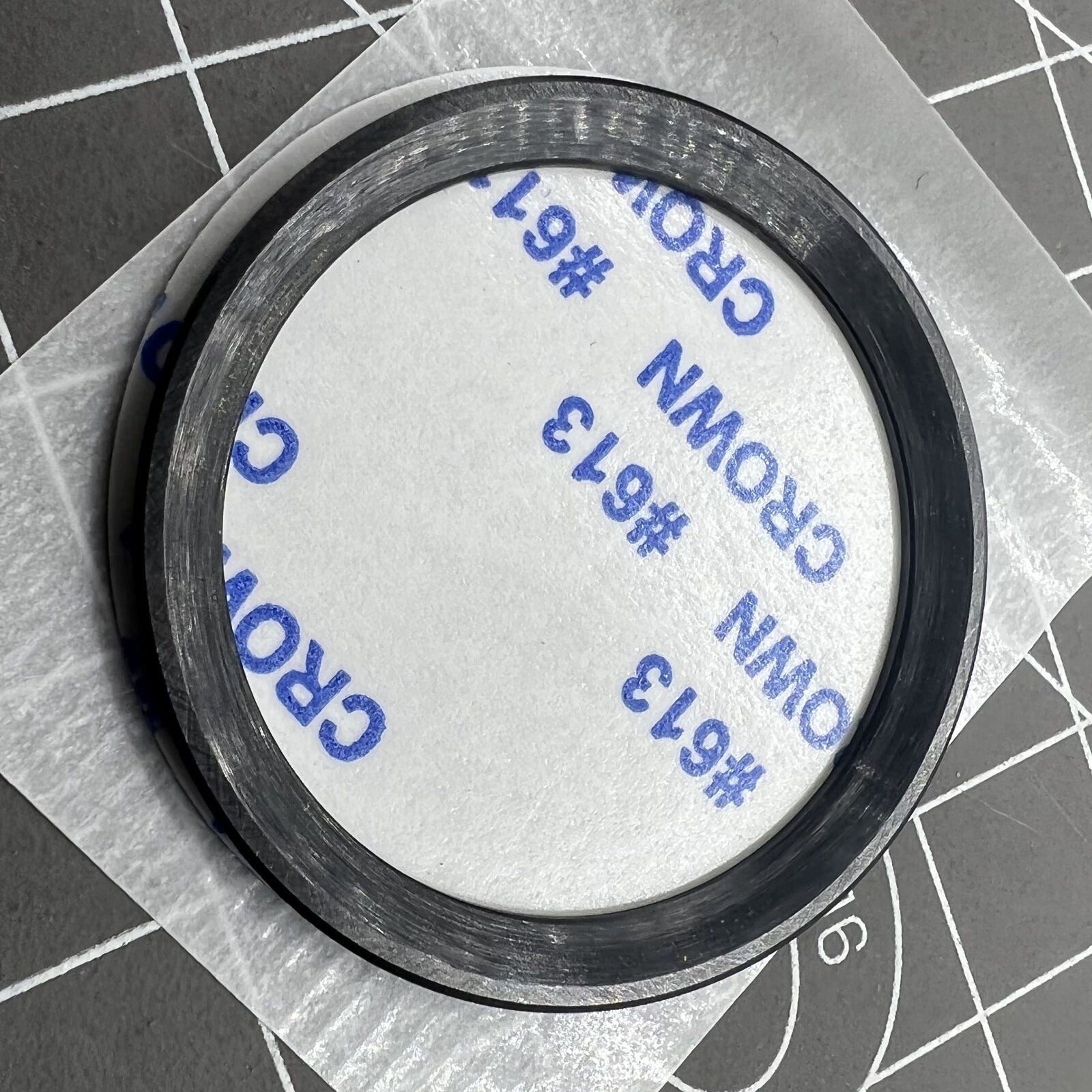 Ceramic black bezel with gold font for Daytona watch, 37.65x30.7mm, durable and stylish.