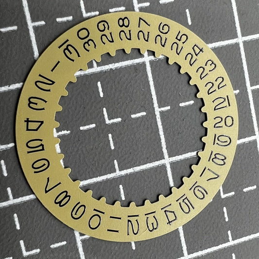Vintage numeral font golden date disk wheel for RLX3135 watch movement, stylish replacement part.