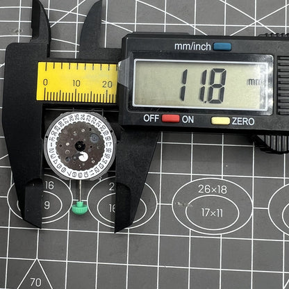 Miyota FS61 chronograph quartz watch movement featuring date at 4, three subdials for precise timekeeping.