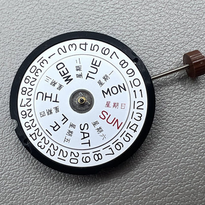 Ronda 517 Swiss quartz movement watch accessory showing English and Chinese day-date display.