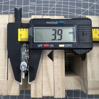 Seiko NH37A automatic watch movement showcasing precise mechanical gears and single calendar feature.