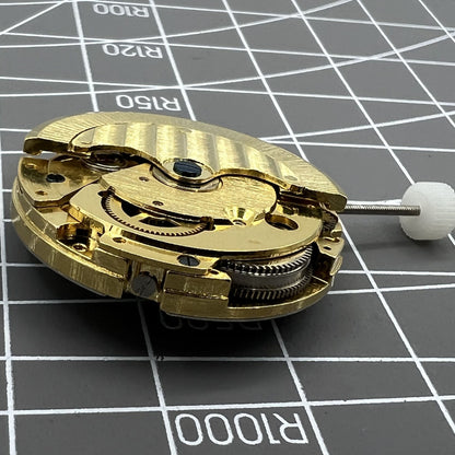 Generic 8205 mechanical watch movement featuring a skeleton dial, star phase display, and small seconds at 5 o?clock for watch enthusiasts.