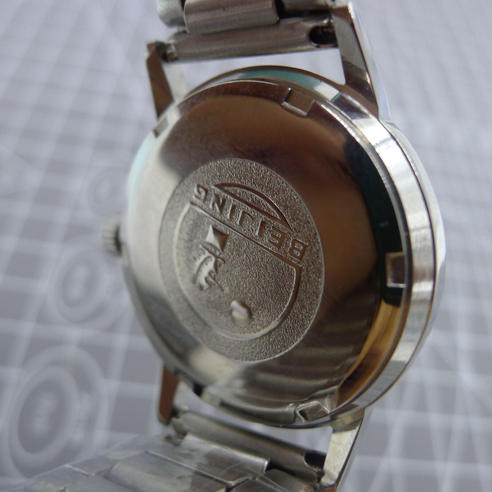 Beijing 36mm manual mechanical watch with silver case, nail-shaped markers, classic design by Beijing brand.