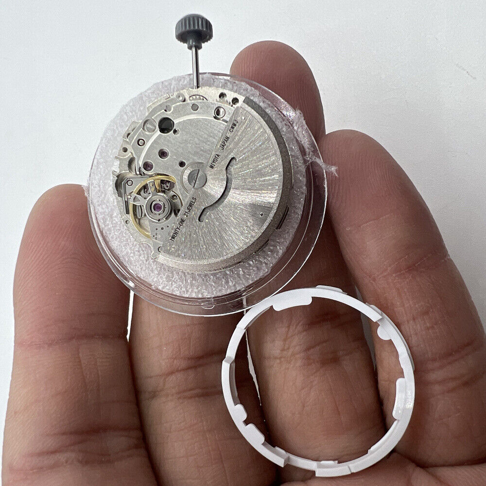 Miyota/Citizen 8215 watch with black dial, date at 6, Japan automatic movement for accurate timekeeping.