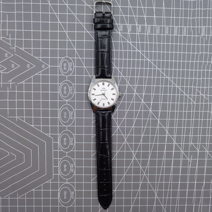 Shanghai Factory 38mm manual mechanical watch with white dial, 3 hands, 19 jewels, classic design.