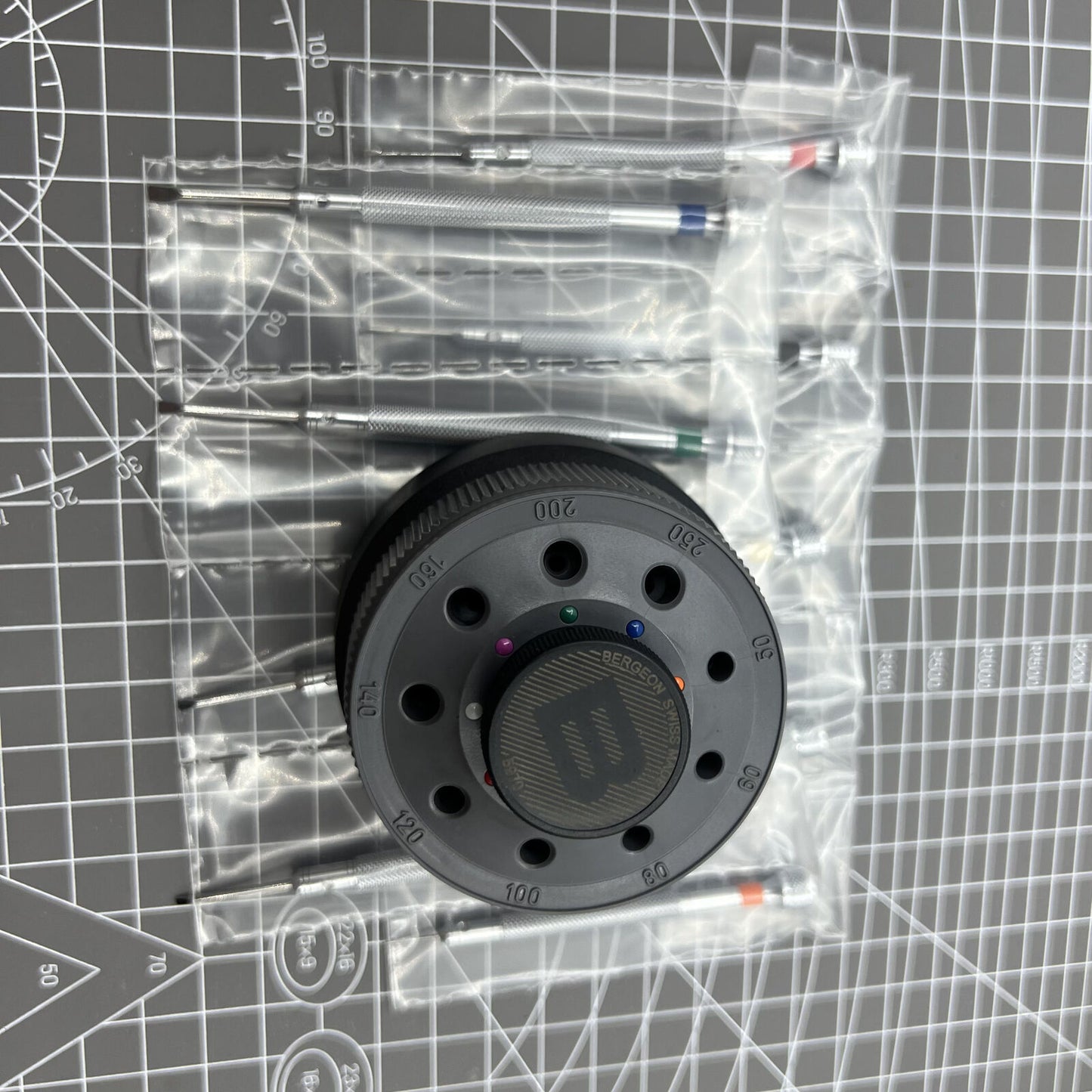 Bergeon 5970 Swiss Made rotating tool set with 9 precision screwdrivers for detailed watch repair tasks.