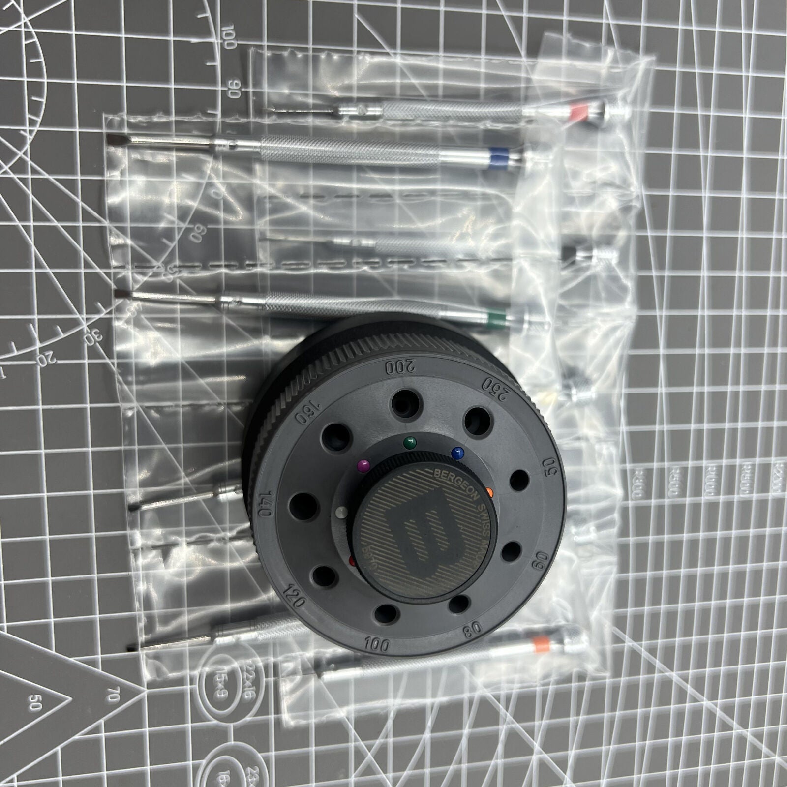 Bergeon 5970 Swiss Made rotating tool set with 9 precision screwdrivers for detailed watch repair tasks.