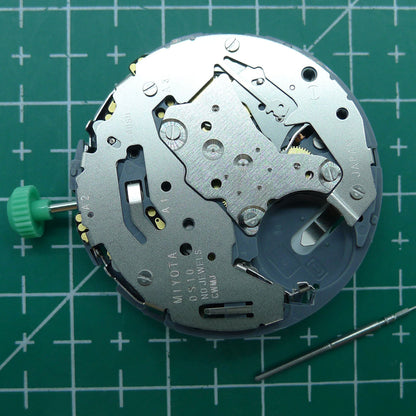 Miyota OS10 quartz watch movement with date window at 3 o'clock, reliable Japanese mechanism for precise timekeeping.