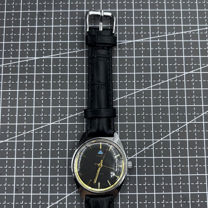 Taihang 32mm manual mechanical watch featuring black strap, gold markers, and black dial for classic style.